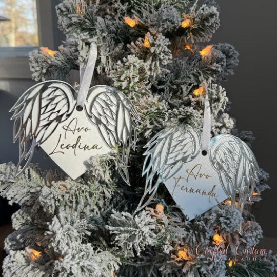 Personalized glitter Christmas ornaments with custom names and colourful ribbons"